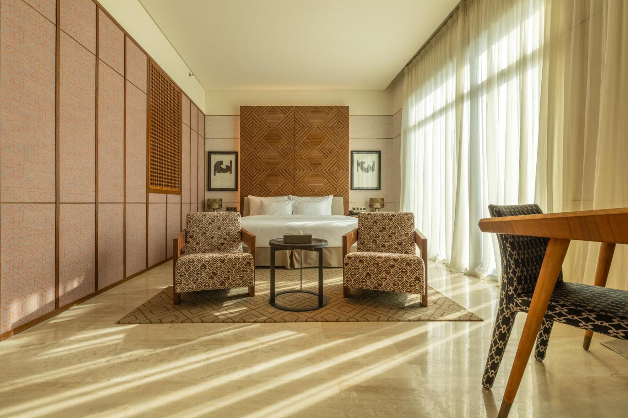 Shirvan Hotel City Yard Yidda Exterior foto A bedroom at the hotel